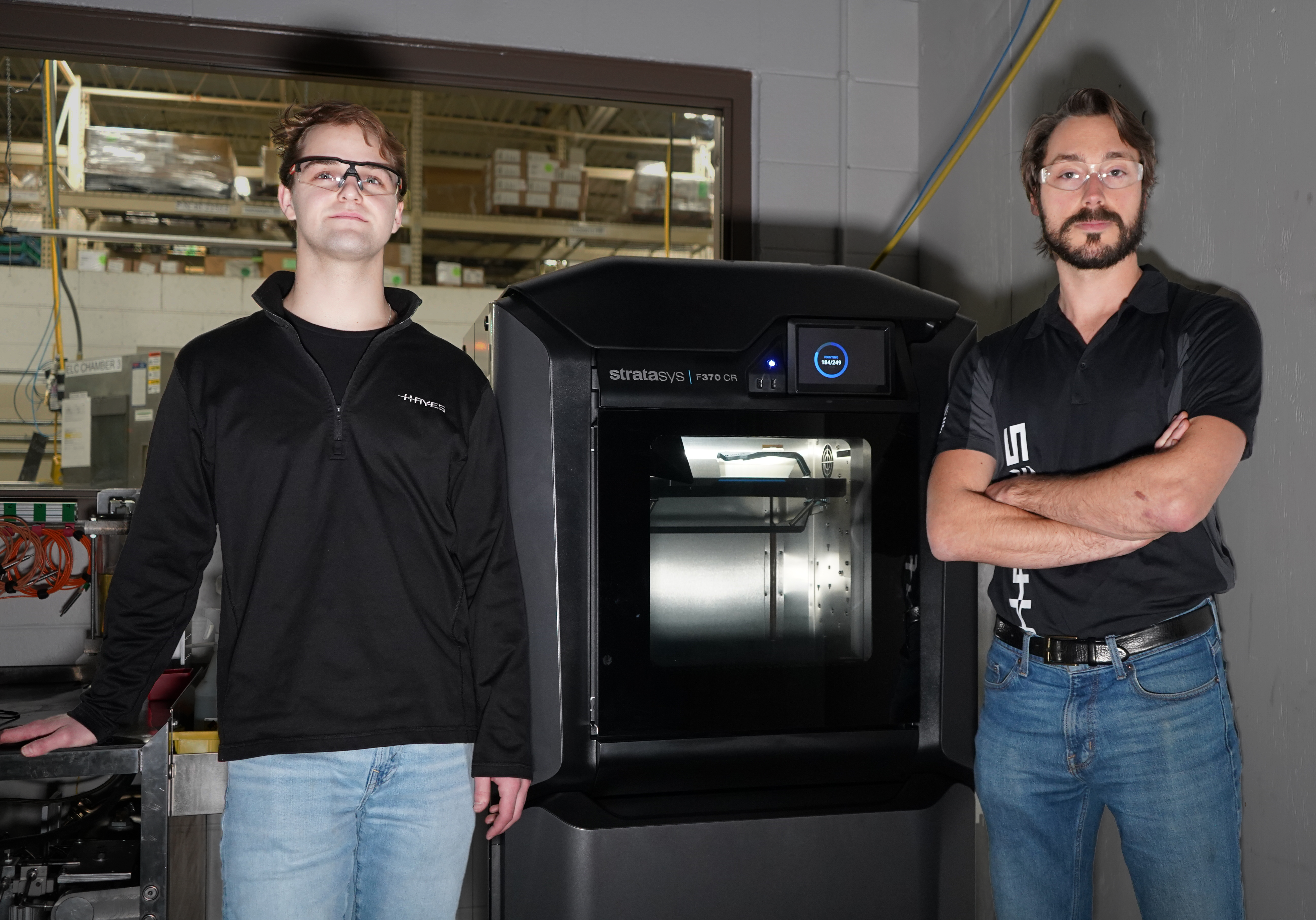 Hayes engineers with 3D printer